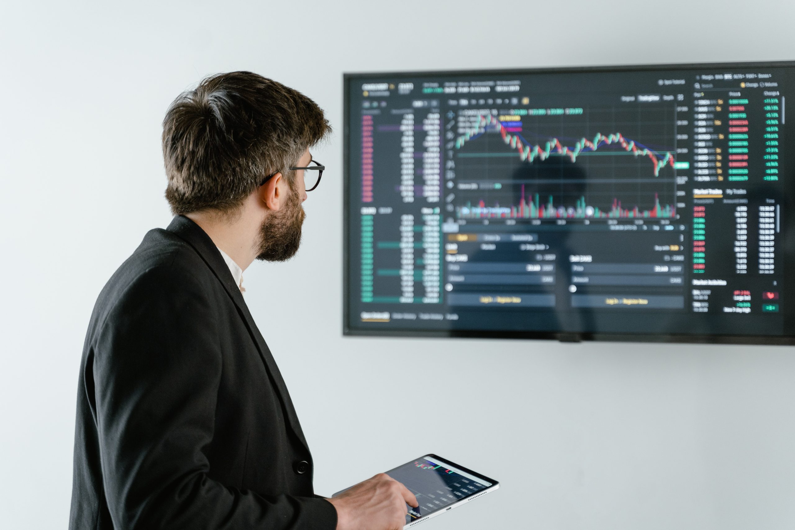 Man looking at data on screen