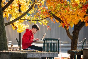 Student outside studying