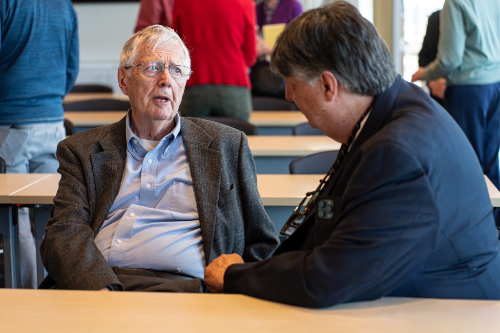 Two men talking